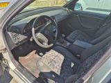 a car that has a steering wheel and a dash board