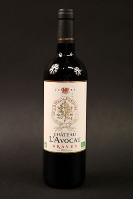 a bottle of wine that is sitting on a table