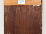 an image of a piece of wood with a label on it