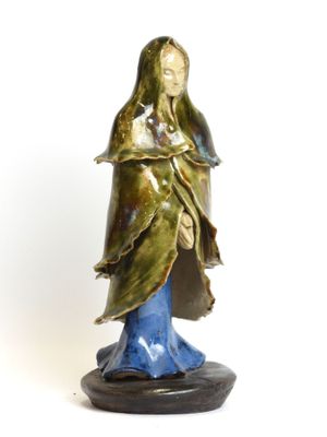 statue of a woman holding a baby in her arms