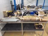 a lot of boxes on a table in a warehouse