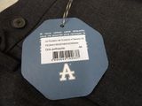 a label on the back of a jacket that says a