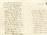 lettre manuscrite écrite à l'encre noire sur une feuille de papier