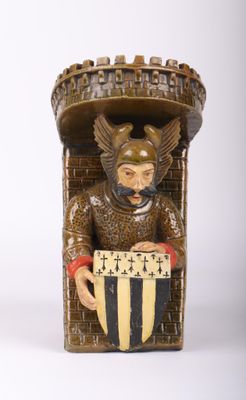 a statue of a man with a shield and shield