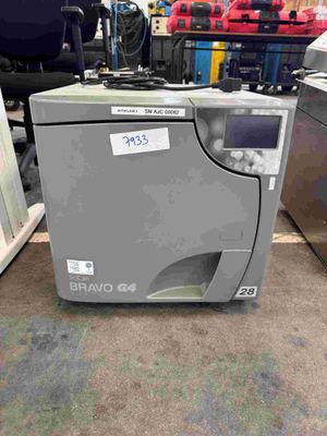 a machine that is sitting on the floor in the room