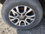 a close up of a tire on a vehicle