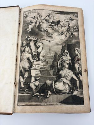 un vieux livre avec la photo d'un homme et d'une femme assis sur un banc