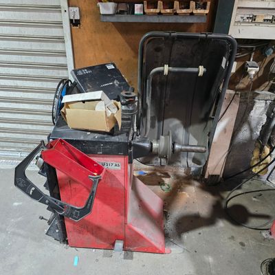 an image of a pile of tools in a garage