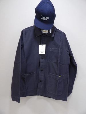 an image of a blue jacket and hat hanging on a wall