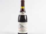a bottle of wine that is sitting on a table