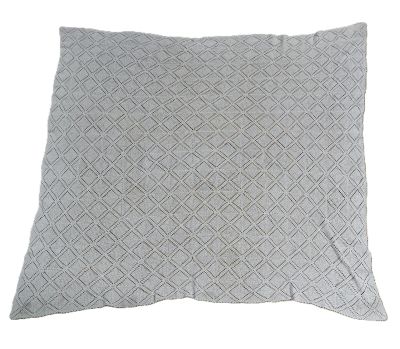 a grey pillow with a diamond pattern on it