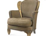 an upholstered chair with gold trim and a brown upholstered seat