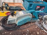 a blue machine that is sitting on top of a table