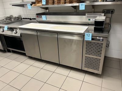 a kitchen with a lot of counter space in it