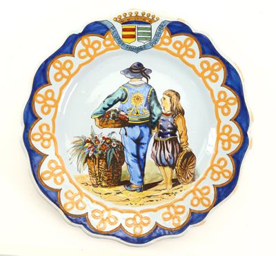 a plate with a picture of a man and a dog on it