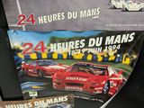 a picture of a poster of a race track with cars on it