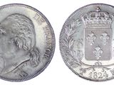 une pièce d'argent surmontée d'une couronne