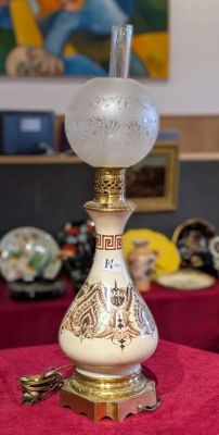 Lampe époque restauration avec réservoir travaillé et sa ver…