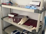 a shelf with many items on it in a room