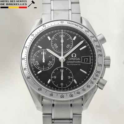 an image of a close up of a watch on a white surface