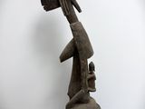 an image of a sculpture of a person with a helmet on