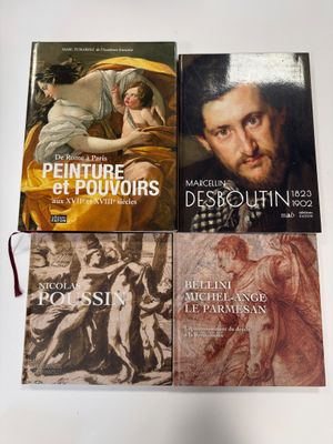 trois livres posés sur une table, à côté d'un tableau représentant un homme et une femme