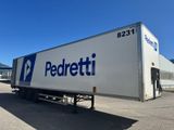 a semi truck that is parked in a parking lot