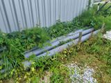many plants growing on the side of a building