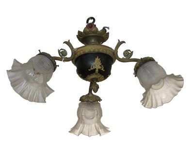 a chandelier with three lamps hanging from the ceiling