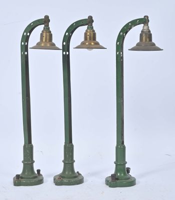 three green street lights on a white background