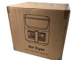 a cardboard box with an air fryer inside of it