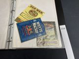 a binder with a lot of different items on it