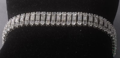 an image of a close up of a bracelet on a mannequin mannequin