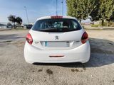 a picture of a white car parked in a parking lot