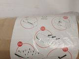 a roll of toilet paper with instructions on it in a box