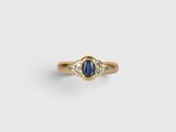 an oval sapphire and diamond ring