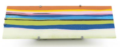 a multicolored piece of art on a white surface