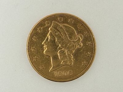 an image of a gold coin with a woman ' s head on it