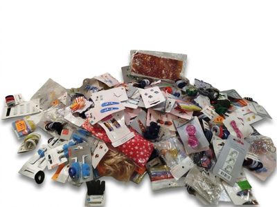 a pile of assorted items on a white surface