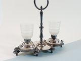 pair of antique silver plated candlesticks with glass holders