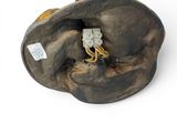 an image of a sculpture of a hat with a string attached to it