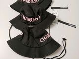 a couple of hats that are sitting on top of a table
