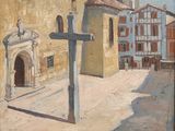 a painting of a cross on the street in front of a building