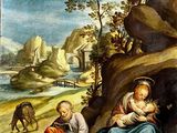 une image représentant un tableau où l'on voit une femme et un enfant dans un paysage rocheux