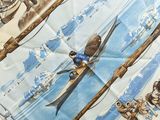 a blue and white table cloth with a picture of a man on skis