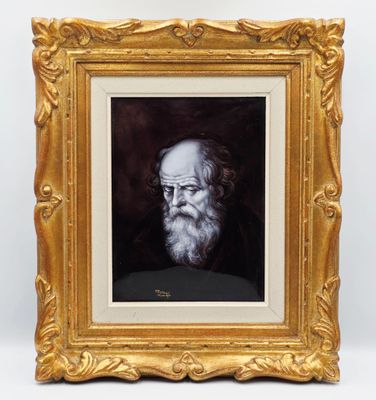 un tableau représentant un homme barbu et portant des lunettes, dans un cadre doré
