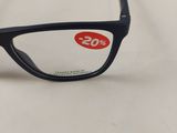 pair of eyeglasses sitting on a table with a price tag on it