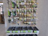a large display of tools in a store for sale