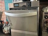 an image of a kitchen with a stove and a dishwasher
