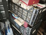 a stack of books sitting on top of a stack of crates
